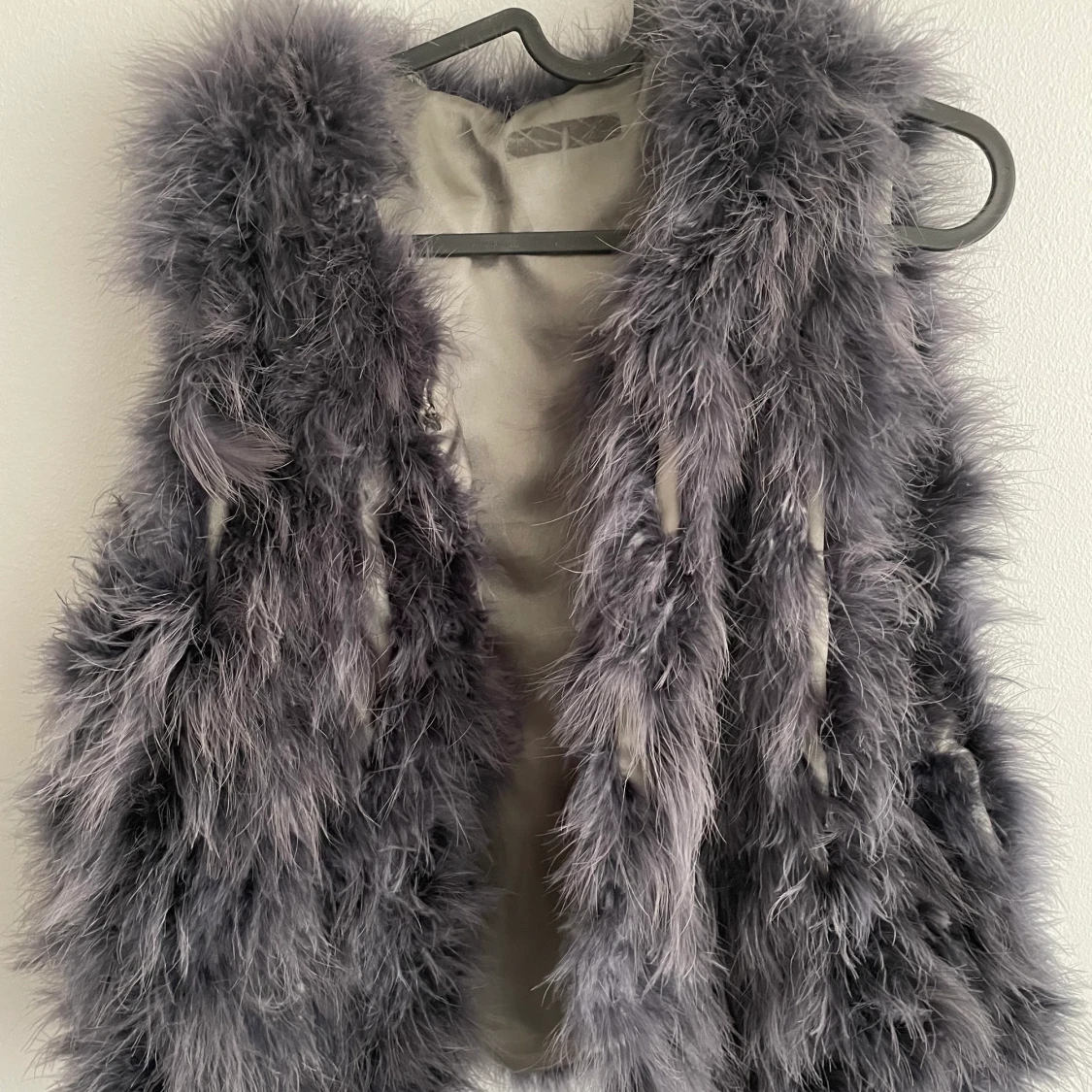 Väst med äkta fjädrar