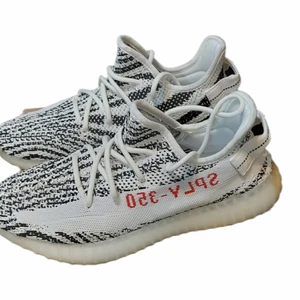 Yeezy 350 Zebra - Yeezy 350 Zebras                                                             Brand New                                                                  Size US9½/ 43⅓                                                          Open for trade. Prefer aj4's or 3's or some cool shoes