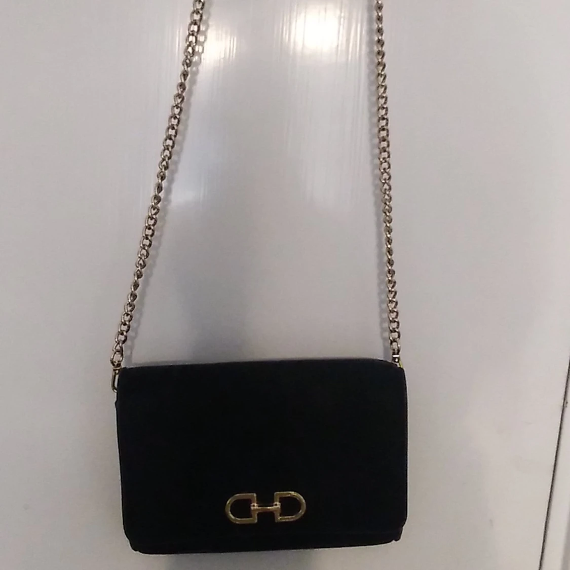 Svart guld handväska