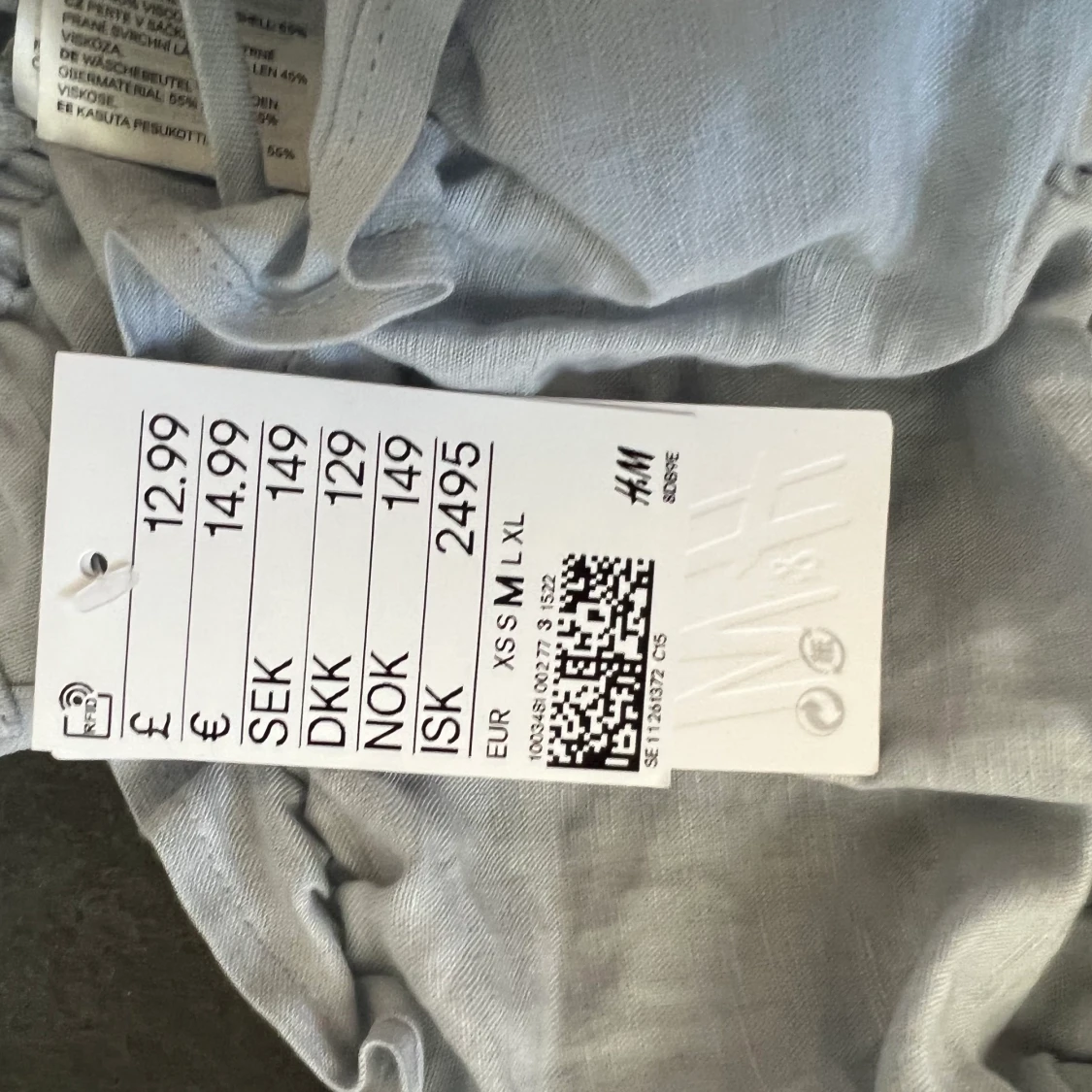 Ljusblå top i linnemix - 91