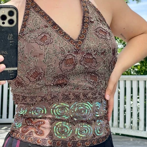 Unik glittrig topp🤎 - Säljer min fina unika topp, märket är Aftershock. Storlek M, super i skicket!❤️‍🔥