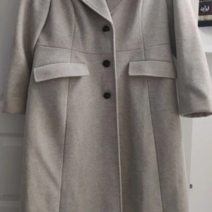 Kappa, dorothy parkins,42 - Som ny använd bara ett fåtala gånger.