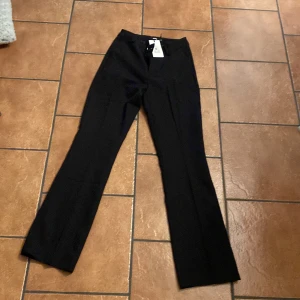 Oanvända kostymbyxor  - Med prislapp kvar helt oanvända