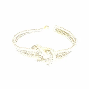 HANDGJORT ARMBAND  - Armbandet är gjort av miyuki seed beeds, och är 18,5 cm långt, knuten i mitten är 2,5×2 cm, själva bandet är 1,2 cm brett, går i svart och koppar med magnetlås, mönstret hämtat från Youtube 