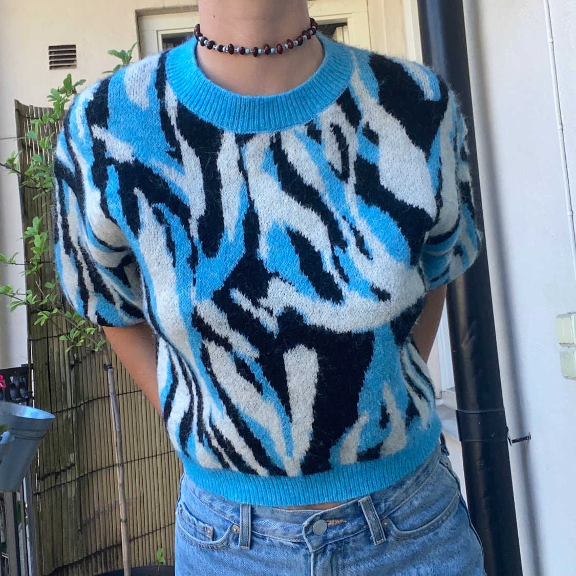 Blå stickad tröja