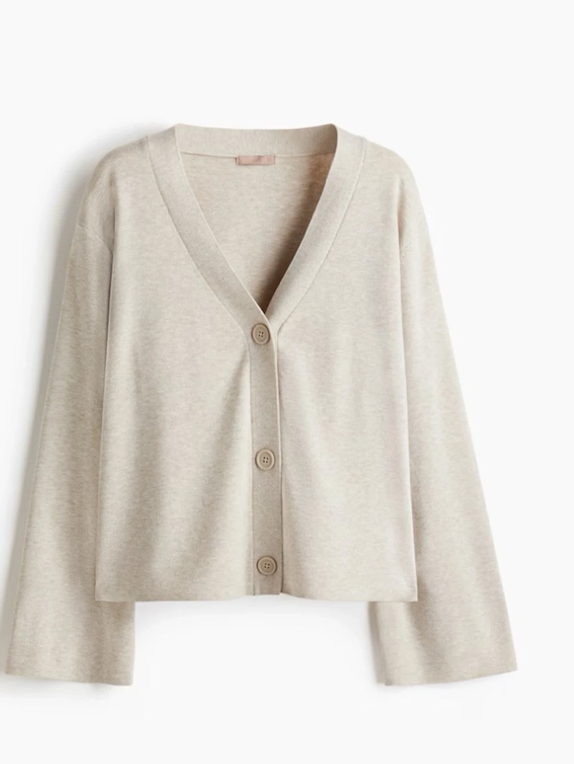 Beige kofta med knappar