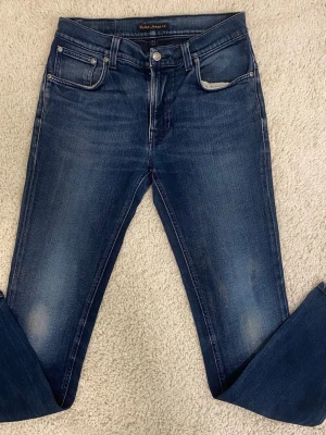 Nudie Thin Finn slim - Säljer dessa feta Nudie jeans i storlek 32/32, inga tecken på användning, Pris 499 kr skriv vid info/bilder!