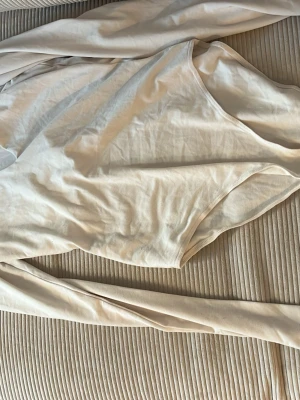 Beige långärmad topp i bomull - .