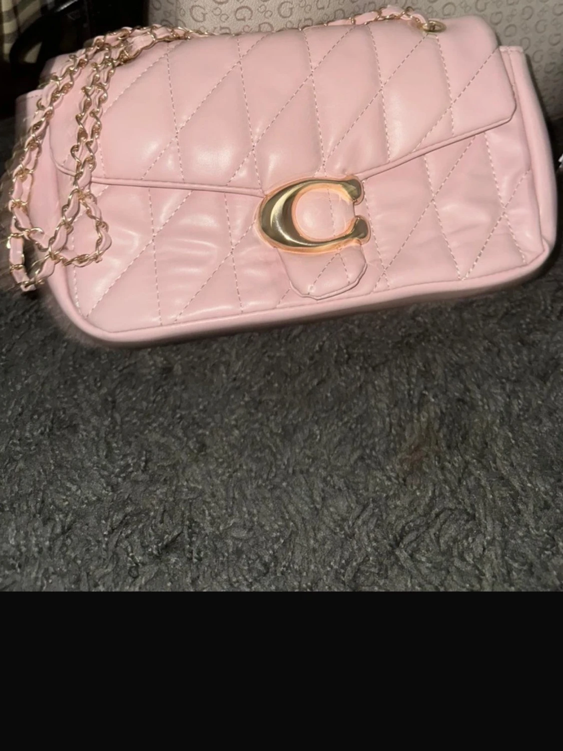 Rosa quiltad handväska från Coach