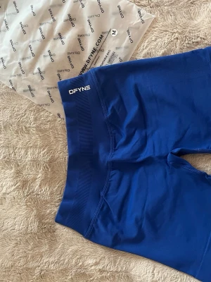 DFYNE Impact shorts - Dfyne shorts i modellen Impact, storlek M, säljer då de inte passade.              Aldrig använda