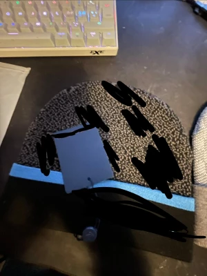 Mössa - Oanvänd ny med tag fast pris.