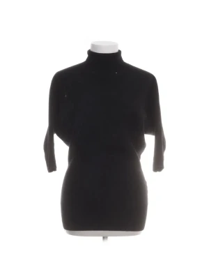 Svart polotröja toteme - Bra skick! Köparen står för frakten 