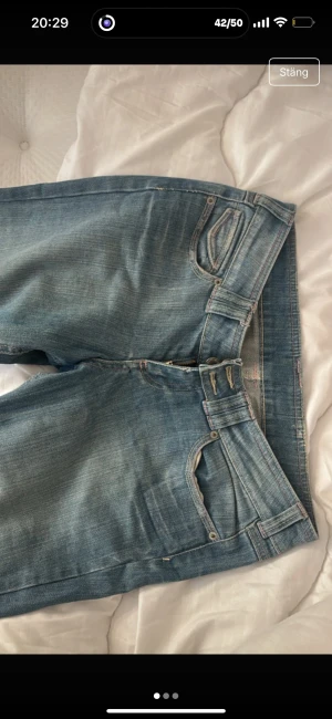 Blå bootcut jeans  - Storlek M men passar S 