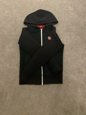 Colmar cardigan - Marinblå cardigan från colmar i storlek S beredd att gå ner i pris vid snabb affär!