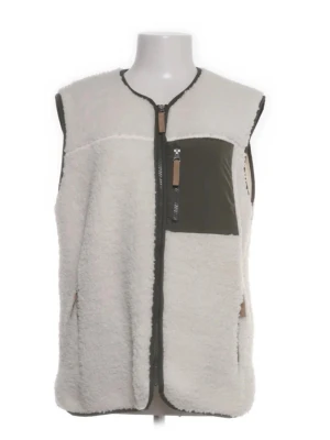 Vit teddyväst med dragkedja - Mysig vit teddyväst med gröna detaljer och dragkedja framtill. Västen har en kontrasterande grön bröstficka med dragkedja och två sidofickor. Perfekt för lager-på-lager och chill stil. Materialet är fluffigt och ger en avslappnad vibe.