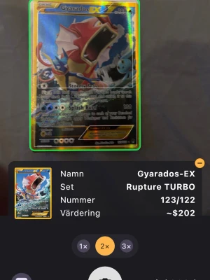 Gyarados-EX  - Säljer ett Gyarados-EX Pokémonkort från setet Rupture TURBO, nummer 123/122. Kortet har en glansig yta med färgstark design och detaljerad illustration av Gyarados. Perfekt för samlare eller Pokémonfans som vill utöka sin kortsamling.
