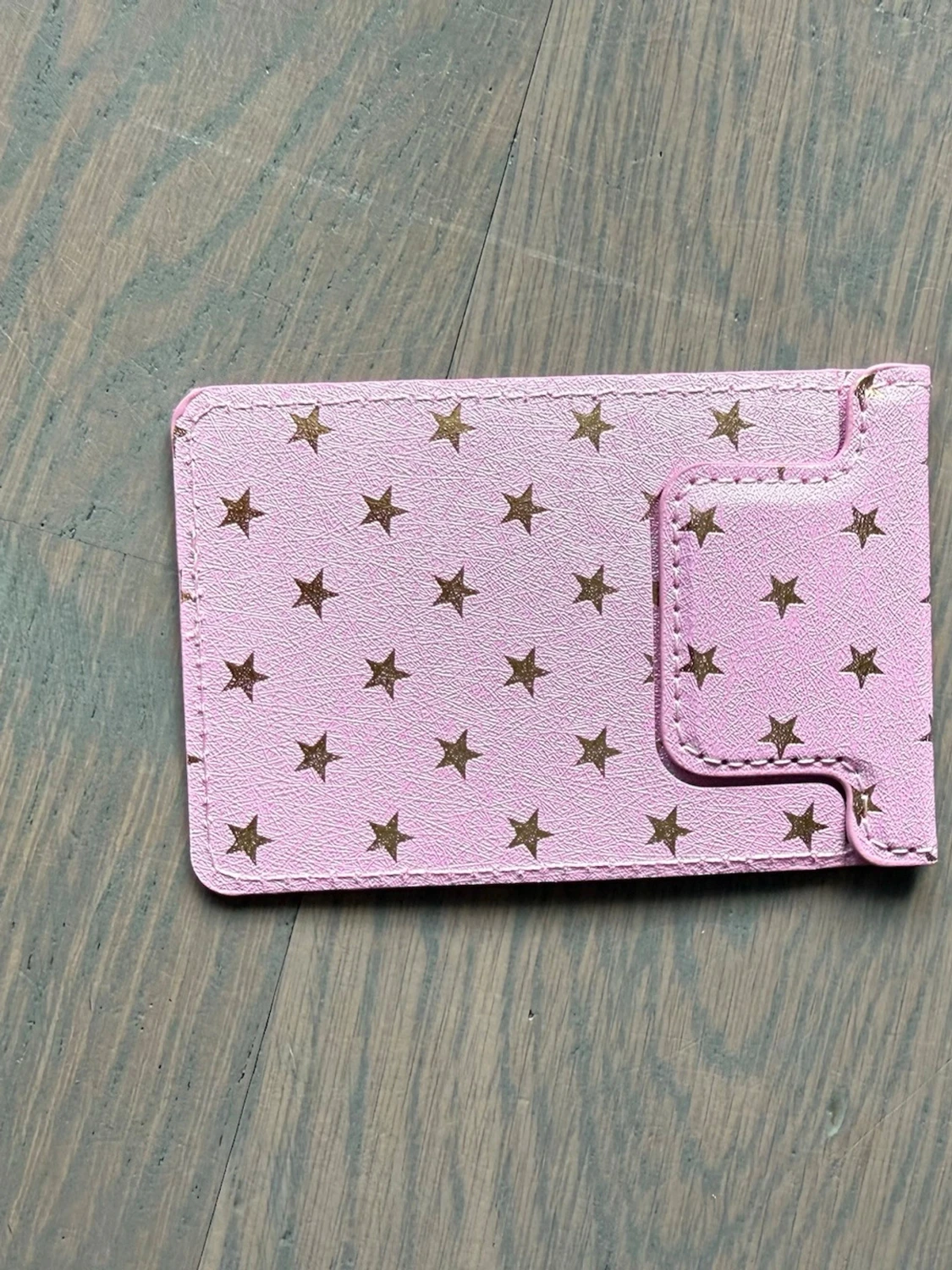 Rosa korthållare med guldstjärnor