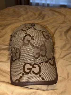 Gucc*i keps Beige - Gucc*i keps ny och oanvänd med tagg.