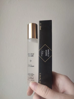 Kilian Angels Share - Kilian Angels Share Perfume. 33ml bottle. New! A great winter/fall fragrance. Comes in 2 different models. I will send you 1 of them. Or you can choose.
