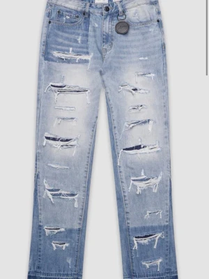 Imola Blue Flare Jeans med slitningar amicci -  Använt en gång vanliga pris 1300kr för små därför säljer