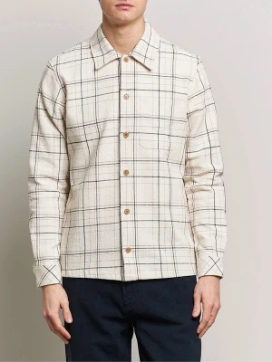 Samaøe samsøe overshirt - Stilren beige overshirt från samsøe samaøe med svart och blått rutmönster. Skjortjackan har klassisk krage, bröstficka och träknappar framtill. Tillverkad i ett mjukt, vävt material som ger en avslappnad men snygg look. Perfekt lager på lager-plagg.