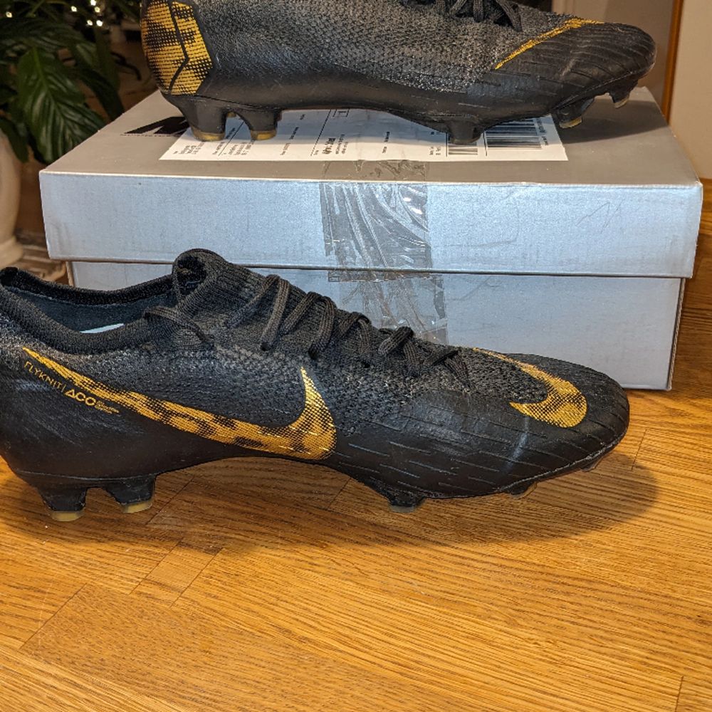 Mercurial vapor 12 elite fg black lux - outlet svart/guld