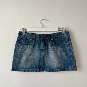 Minikjol lee - Midja: 37 cm Längd: 20 cm