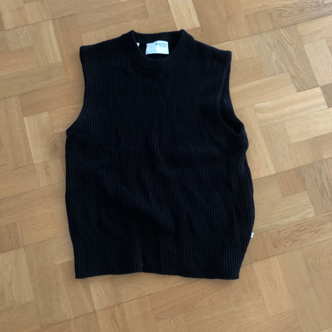 Selenets homme väst