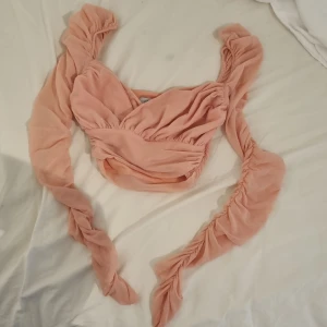 Långärmad meshblus - Långärmad blus/tröja i rosa mesh. Fint skick, endast andvänd några enstaka gånger