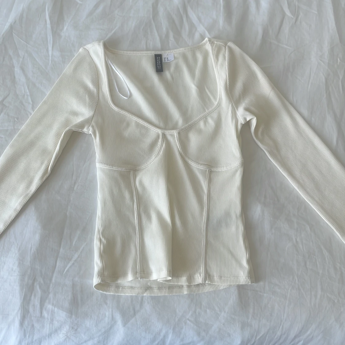 Långärmad ribbad tröja