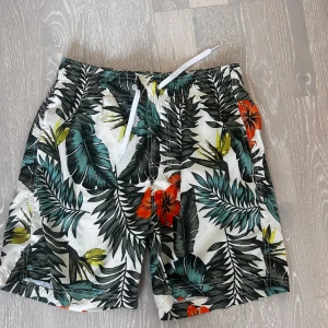 Badshorts  - Fina badshorts med fickor. 