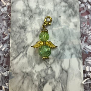 Grön/genomskinlig lyckoängel - Grön/genomskinlig lyckoängel.