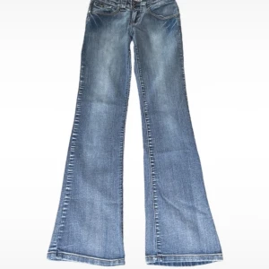 Jeans - 35 midja - 100 längd