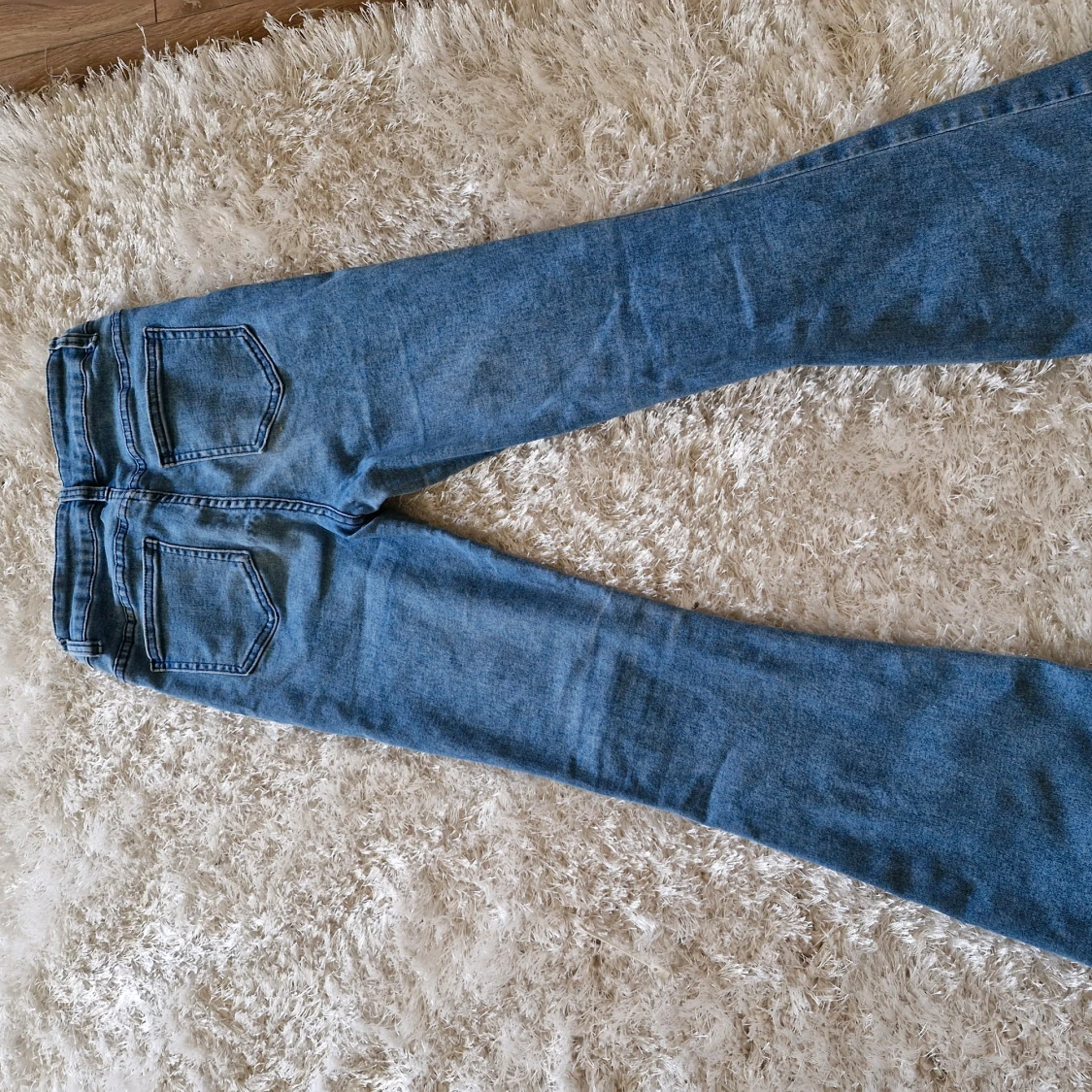 Utsvängda jeans XS - 91