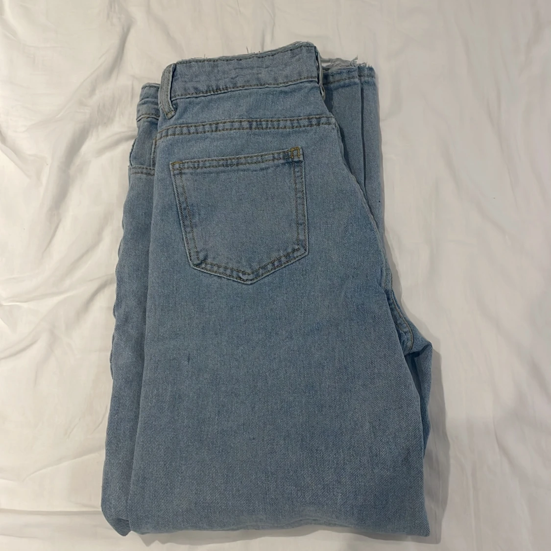 Ljusblåa jeans för barn - 91