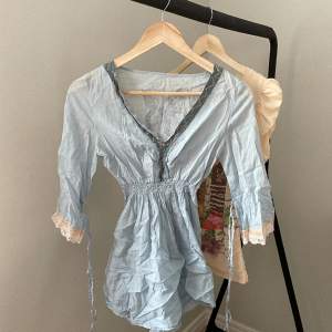 Blue blouse in thin material  