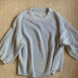 Stickad trekvarts tröja  - Stickad trekvart tröja från ett danskt företag