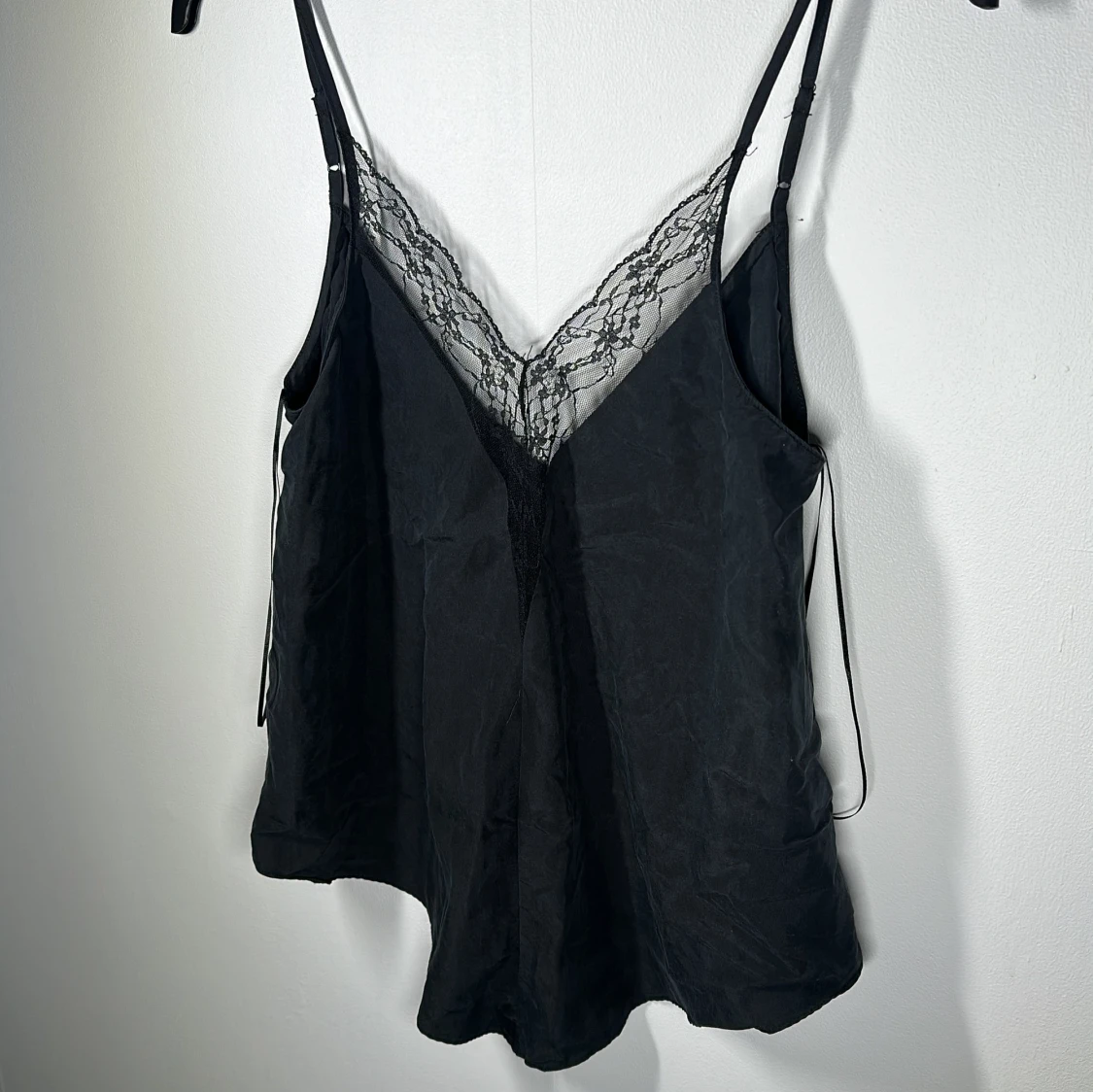 Svart topp med lace details - 90