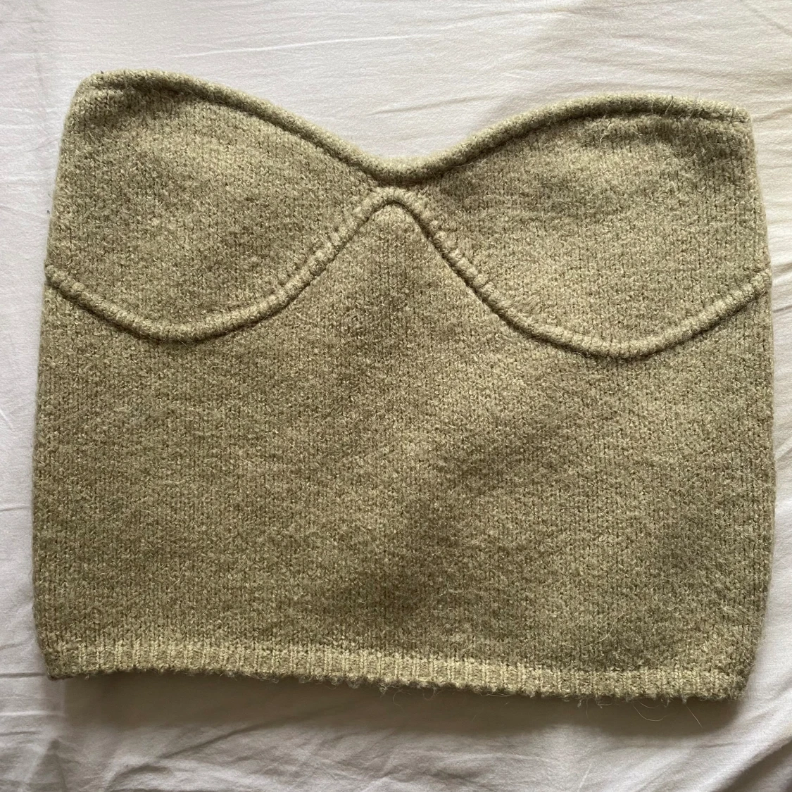 Grön stickad bandeautopp