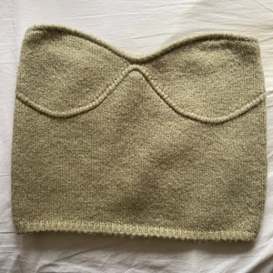 Grön stickad bandeautopp - Använd ett fåtal gånger.