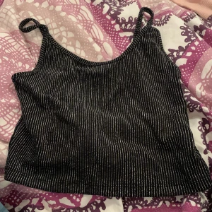 Disco topp - Disco topp glittrig silver svart 