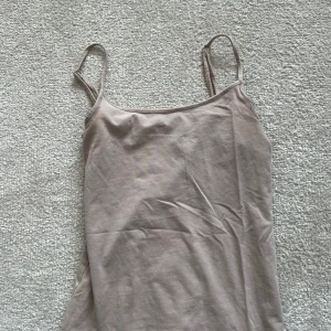 Beige linne  - Beige linne, justerbar. 