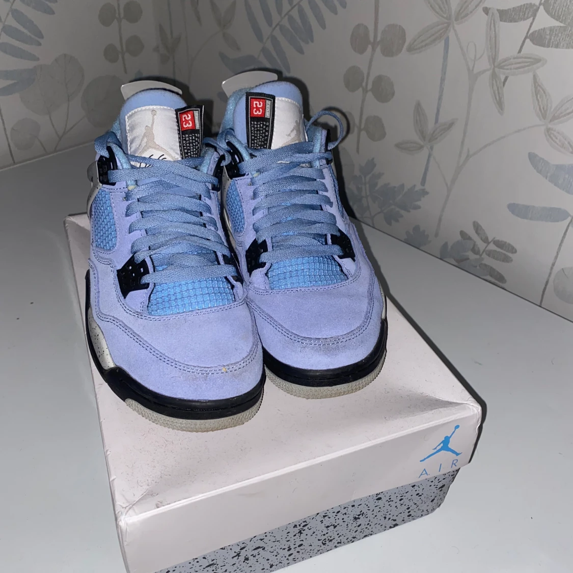 Jordan 4 University Blue  - 91