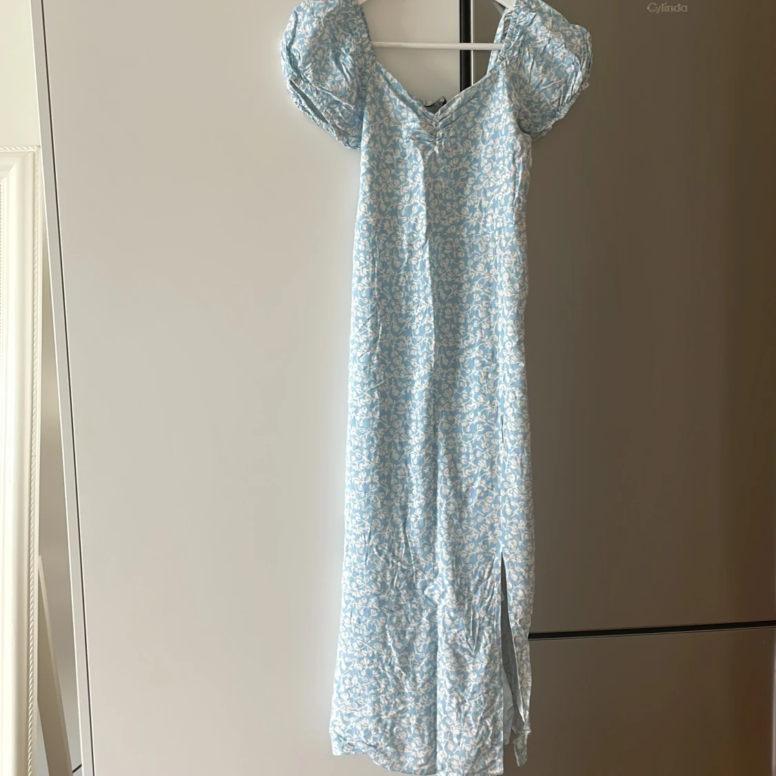 Ljus blå lång klänning