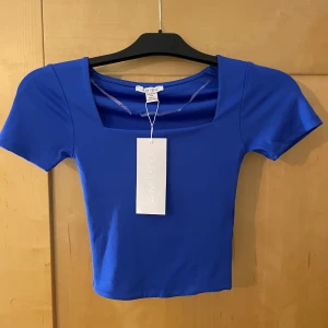 Blå topp - Oanvänd jätte skönt material ”träningsmaterial”
