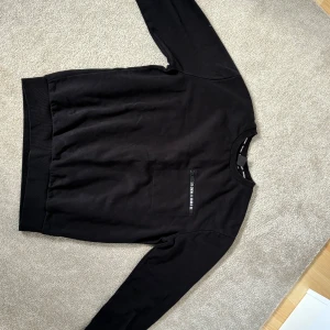 Black sweater  - The item hasn’t been worn that much and has been taken care of very well. The clothing has no issues whatsoever and no damages. The item has also been cleaned very well so it’s not dirty or anything.
