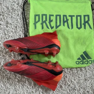 Ett par adidas predator 19.1 FG - Fotbollsskor storlek 43 och tillkommer med original påse.
