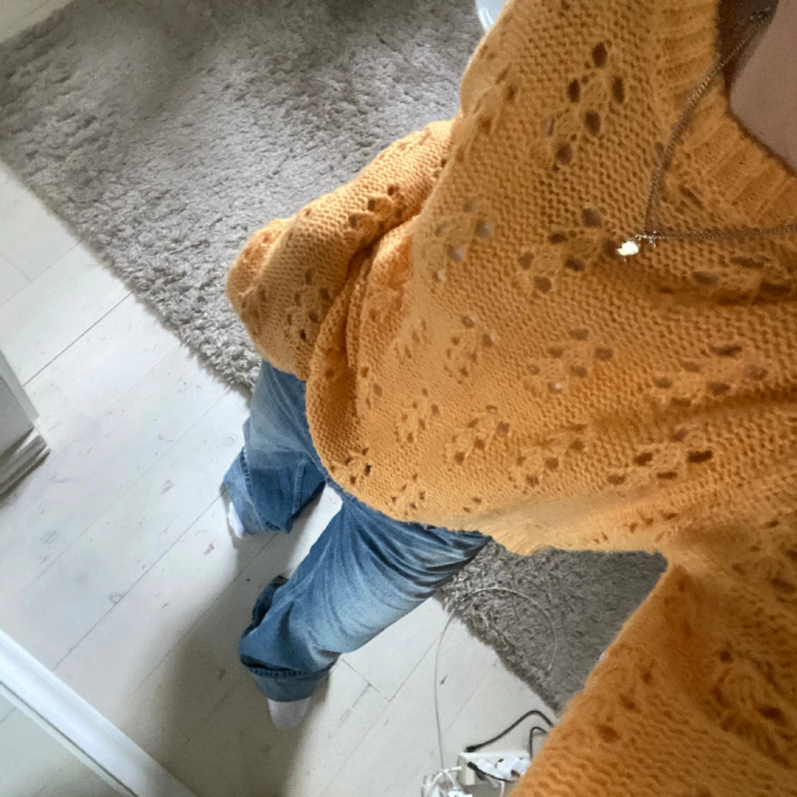 Orange stickad tröja