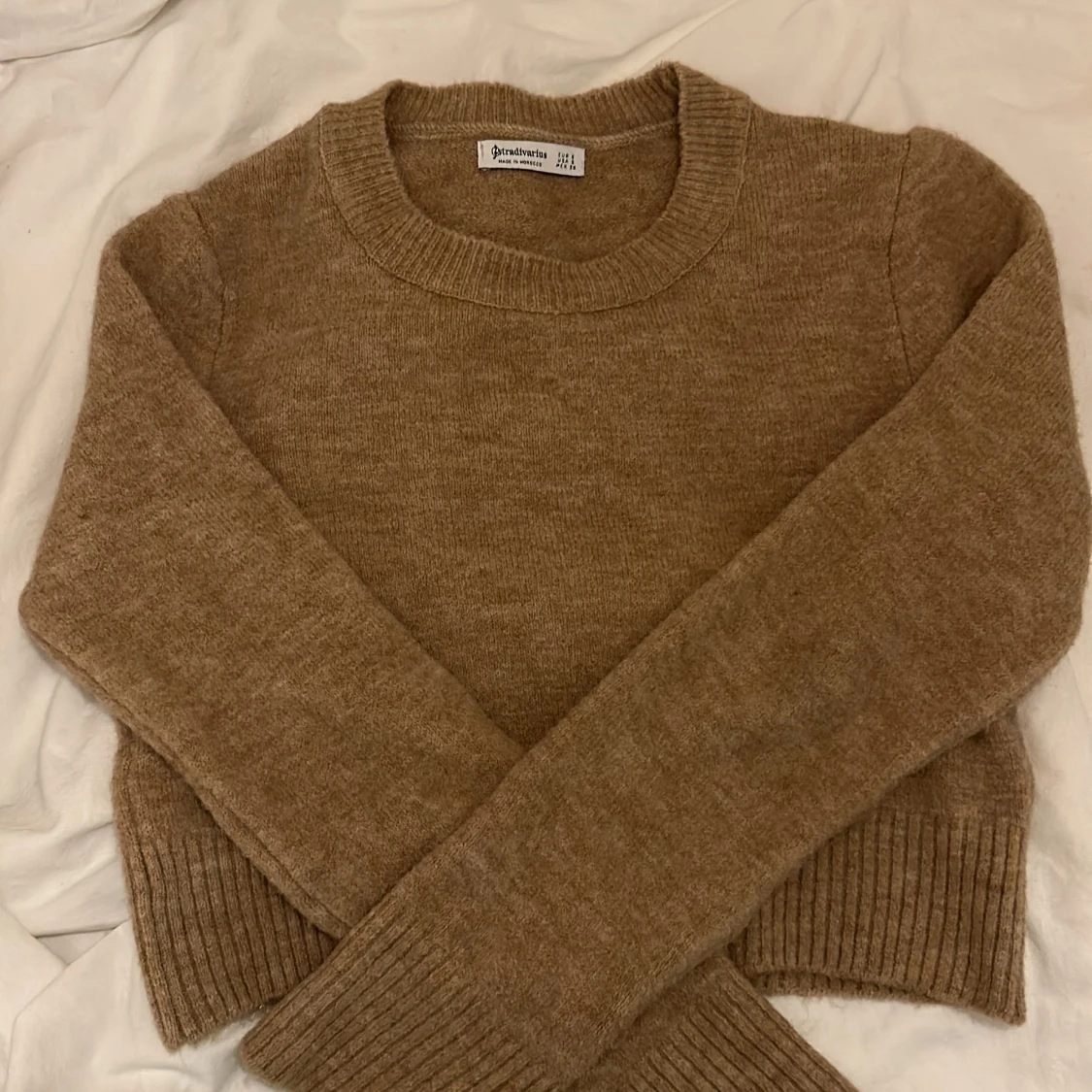 Stickad tröja