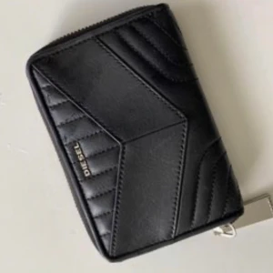 Diesel plånbok  - Fint skick  Diesel  Plånbok  Svart  